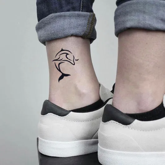 Tiny Dolphin Ankle Tattoo
