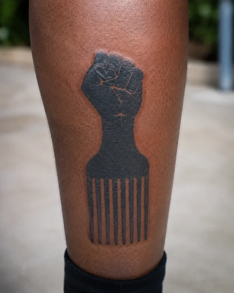 Afro Comb with Fist Tattoo