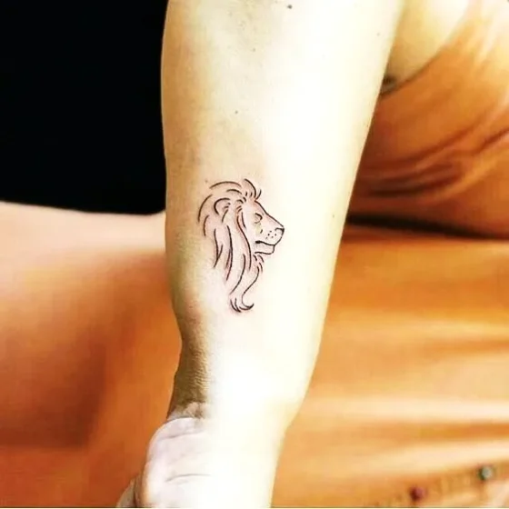 Minimalist Lion Head Tattoo
