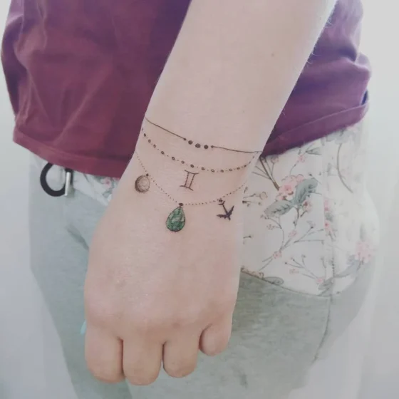 Tiny Emerald  Wrist Tattoo