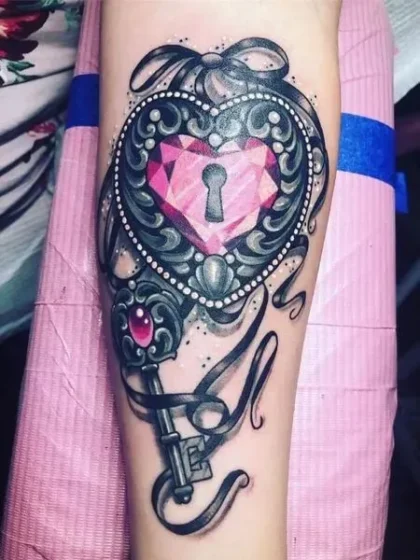 Ruby-Encrusted Lock and Key Tattoo