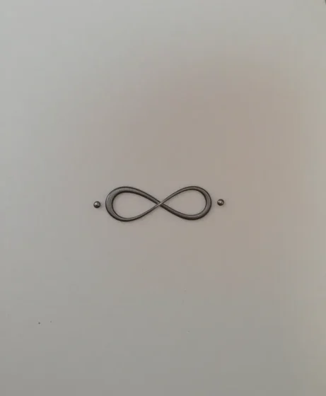 Tiny Infinity Tattoo