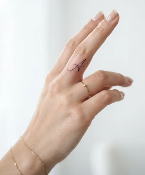 A Fine Cursive Initial on One Finger